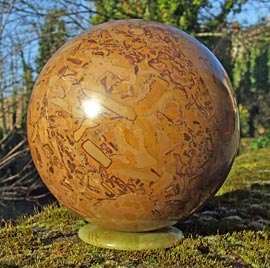 Sphere in brown variegated marble