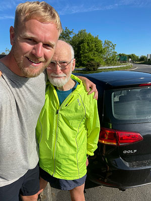 Philip Goddard with a particularly friendly driver. just prior to next stage of hitch-hike
